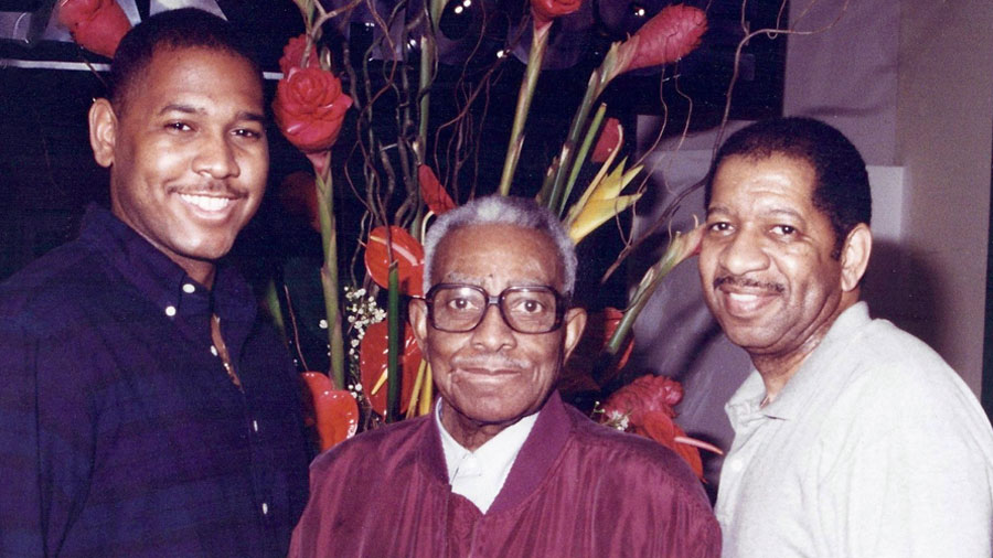 Ather Williams III stands with his grandfather Ather and father Ather Jr. in the lobby of a Las Vegas resort.