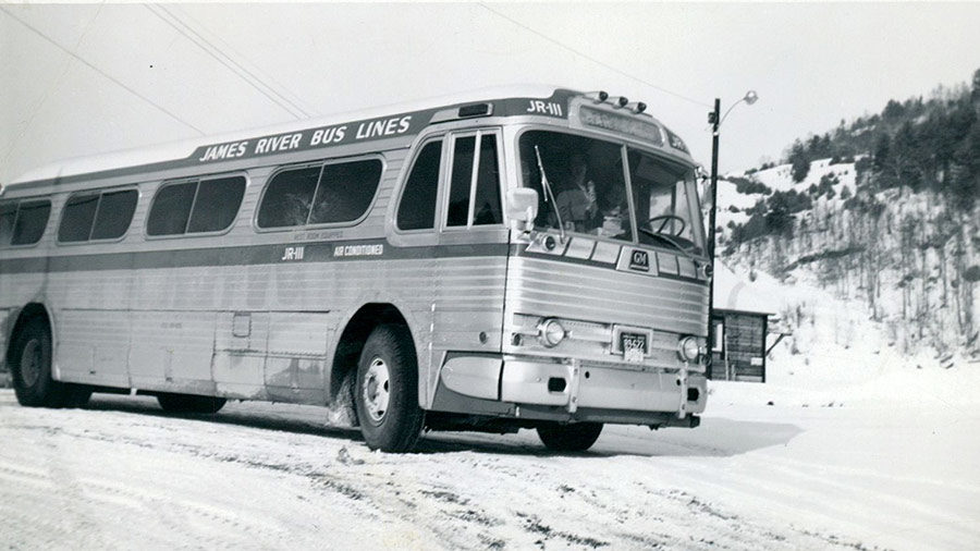 historic black and white photo of a James River bus in snow