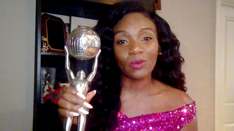 Purple box with the words 52nd NAACP Image Awards next to image of a woman in a pink dress holding an award trophy