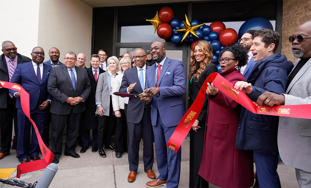  A group of people attend the ribbon cutting ceremony for First Independence Bank in Minnesota
