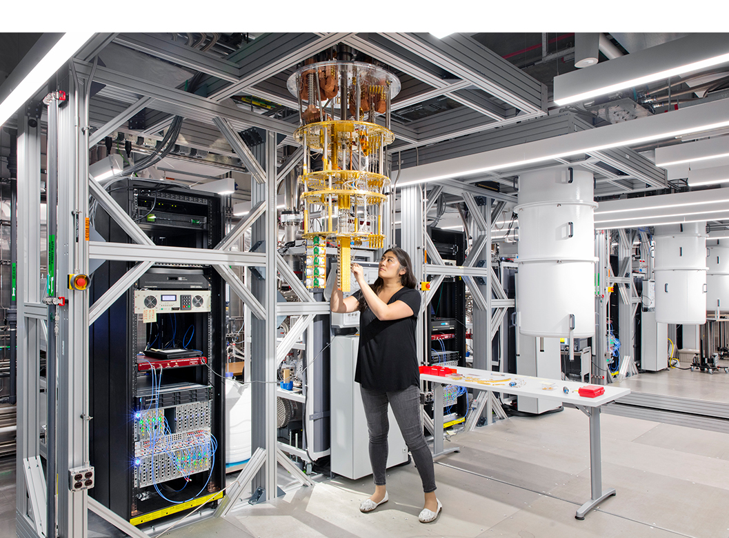  A scientist specializing in quantum computing works on a quantum computer at an IBM Quantum Lab.