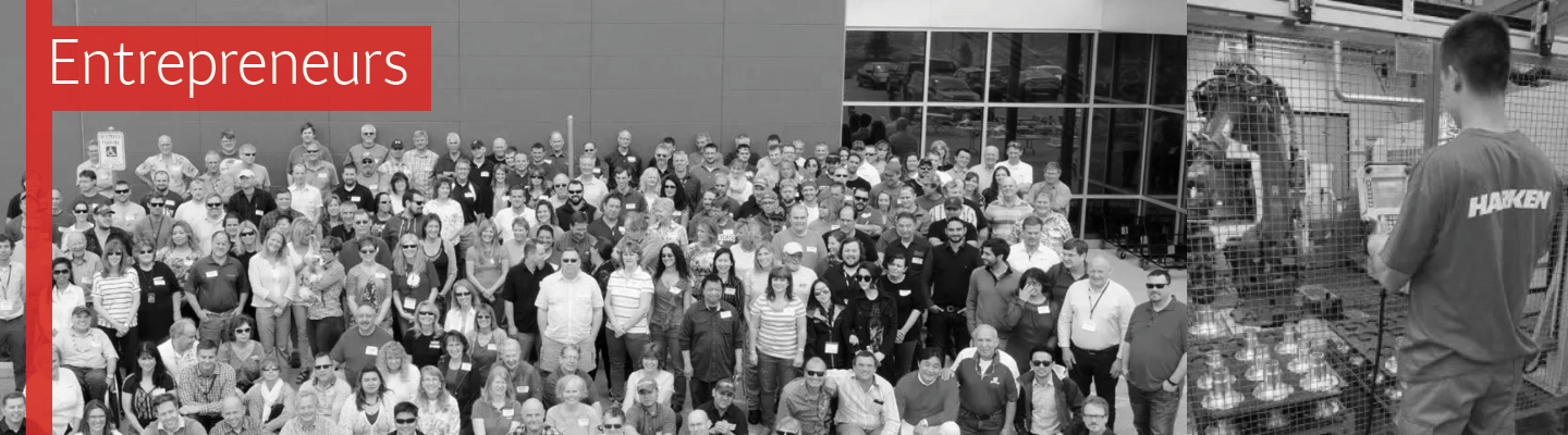 A black and white photo shows company employees standing together. On the right is an image of person wearing a Harken T-shirt. The text Entrepreneurs is in the top right.