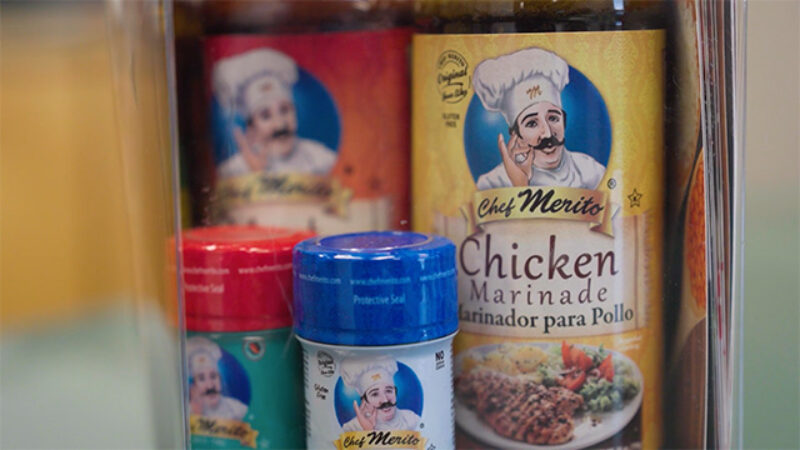 A selection of bottles of chicken marinade and spice blends from Chef Merito.