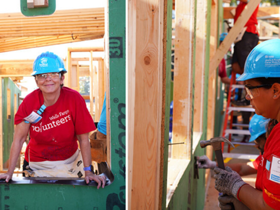 Two women work on the construction site of an unfinished home.