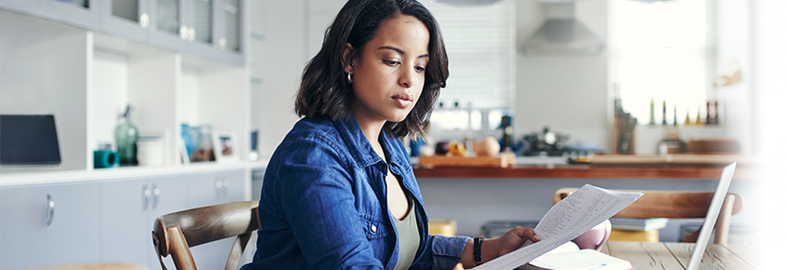Woman reviewing tips to pay less taxes