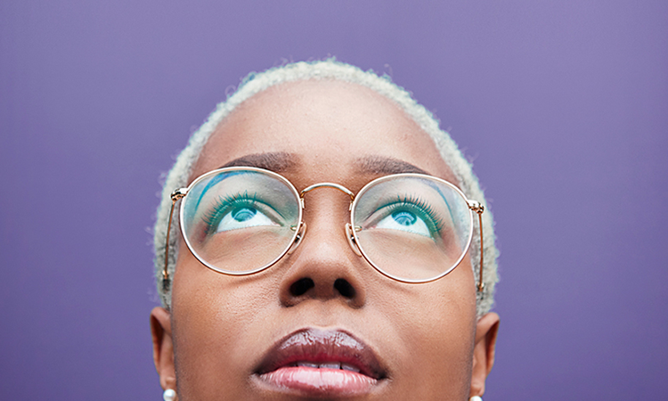 Woman reviewing check fraud prevention tips