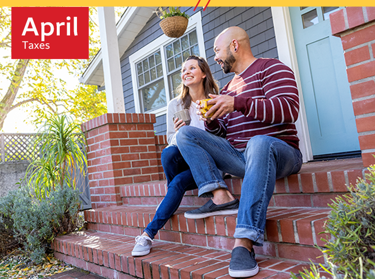 April - Taxes - Couple smiling after reviewing tax saving tips