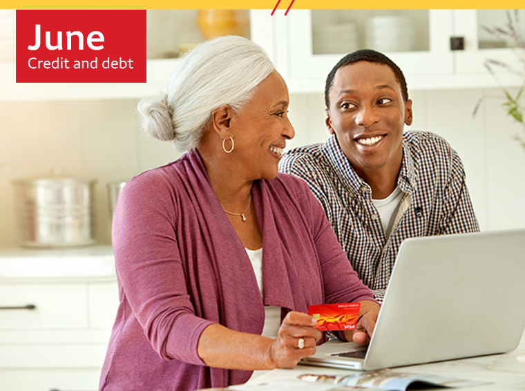June - Credit and Debt - People smiling at computer after reviewing credit tips