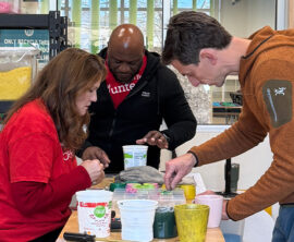 Wells Fargo employees make crafts out of reusable plastic.