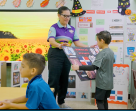 An individual working with children in an early learning center.