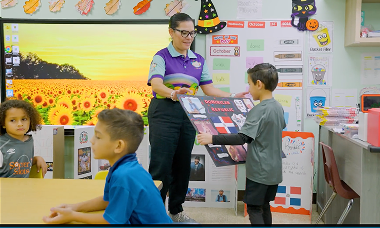An individual working with children in an early learning center.
