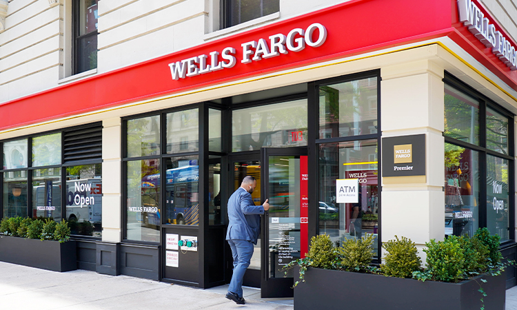 A person walks into a Wells Fargo branch