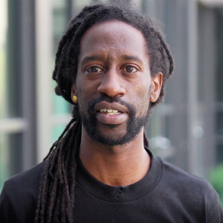 A man in a black t-shirt