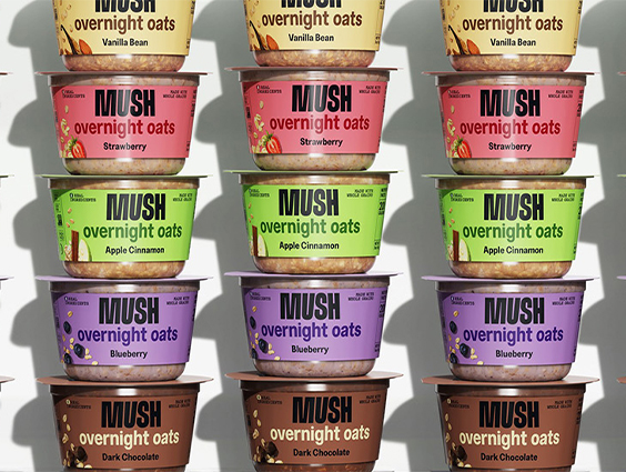 Three stacks are pictured, each containing five containers of colorful MUSH overnight oats.
