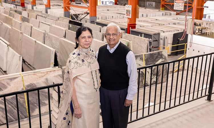 Manu and Rika Shah, Co-Founders of MSI stand in front of their natural stone warehouse and showroom.