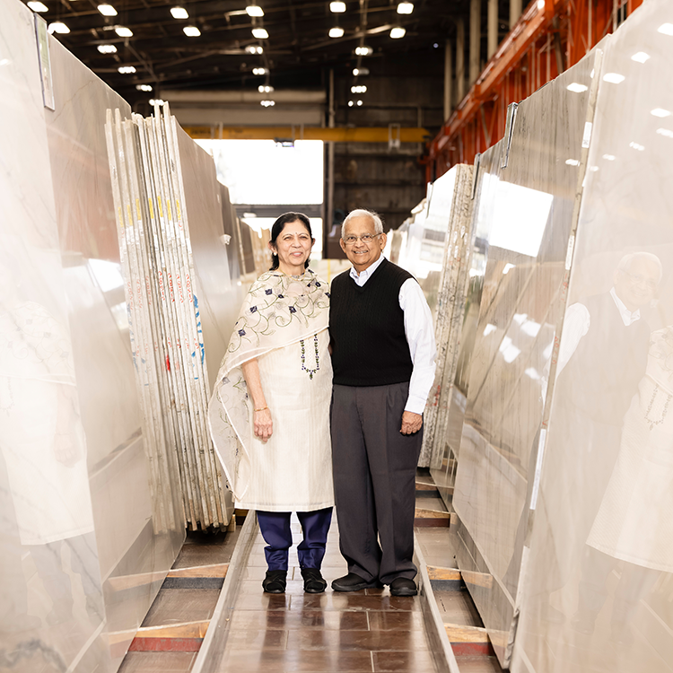 Manu and Rika Shah, Co-Founders of MSI stand in front of their natural stone warehouse and showroom.