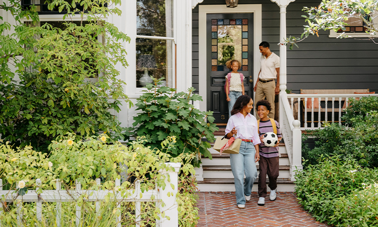 A family of four leaves their home on their way to a youth soccer match.