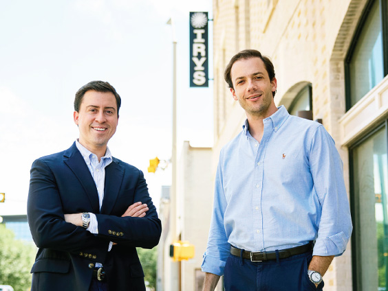 Two men from Irys Technologies stand outside