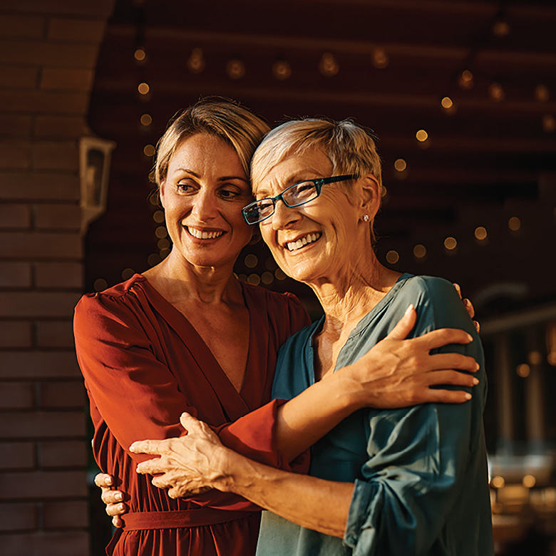 A mother and daughter hug