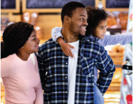 A family shopping in a grocery store.