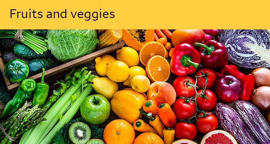 Under the heading “Fruits and veggies,” there is a colorful layout of fruit and vegetables, including apples, oranges, corn, cabbage, peppers, onions, and celery.