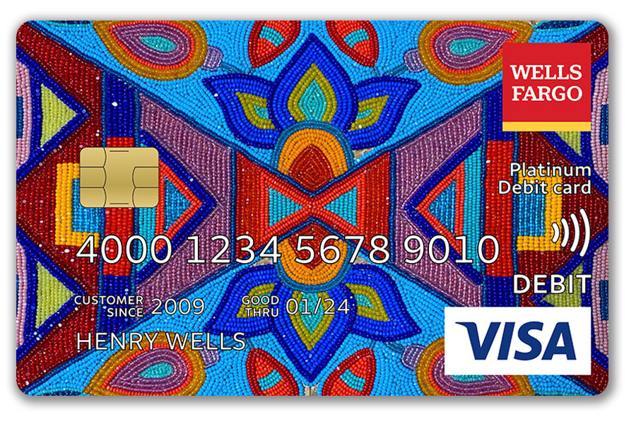 A Wells Fargo debit card features an art piece that uses different colored beads in a geometric design.