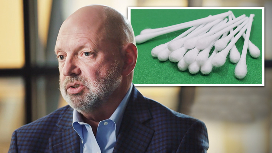 John Nims, CEO of U.S. Cotton, a subsidiary of Parkdale, Inc., pictured in a frame with Qtip style swabs pictured in an inset box