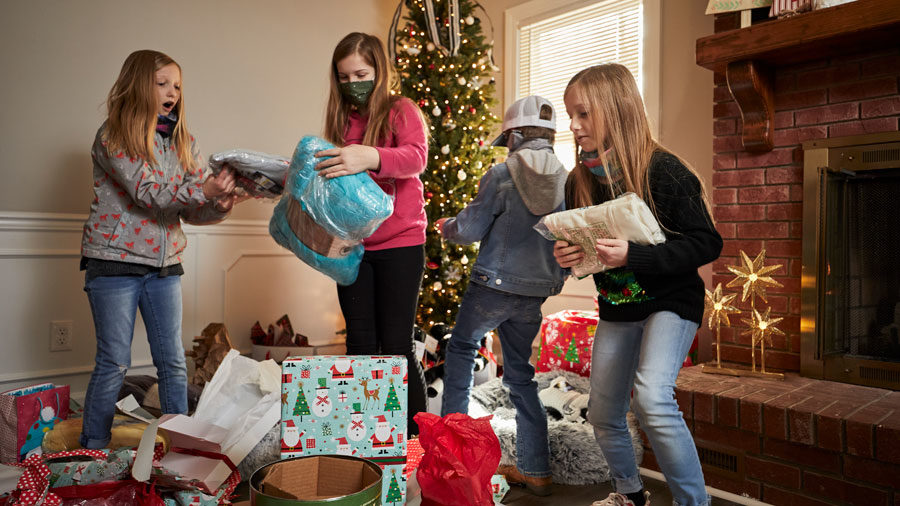 The Myatt children opening Christmas presents.